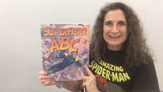 librarian with superhero book