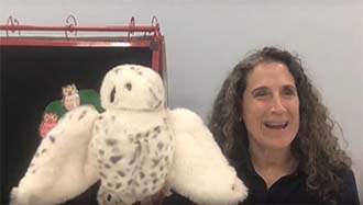 Ms. Georgi with owl puppet