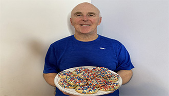 chef Rob with red white and blue sprinkle cookies