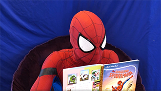 Spiderman reading book